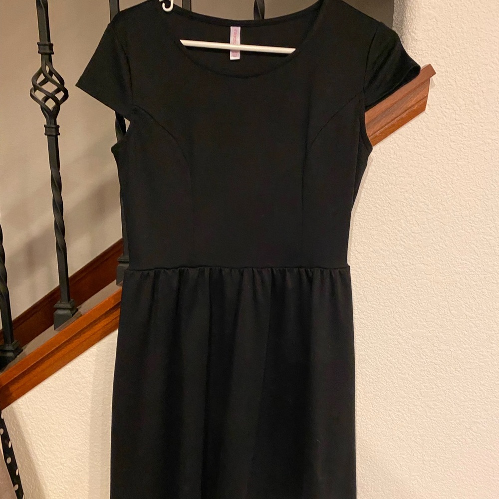 Black size medium xhiliration black dress,  brand new never worn